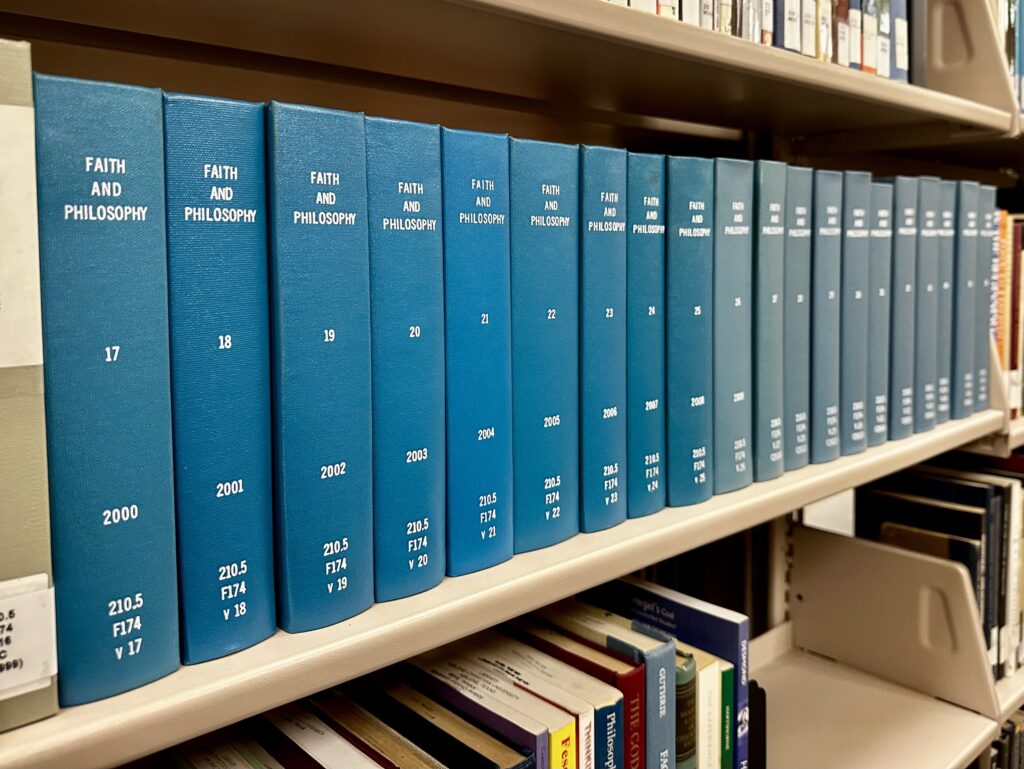 "Faith and Philosophy" books in the Brown Library. (photo by Leslie Carrigan)
