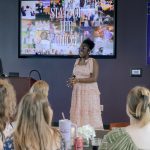 Tamil Adele, senior criminal justice major from Midland and Zeke Whisenhunt, senior engineering major from Greenbrier, Arkansas prepare to pass down the presidents bible and senates mallet. (Photo by Yeeun Goh, senior advertising public relations major from Osaka, Japan.)